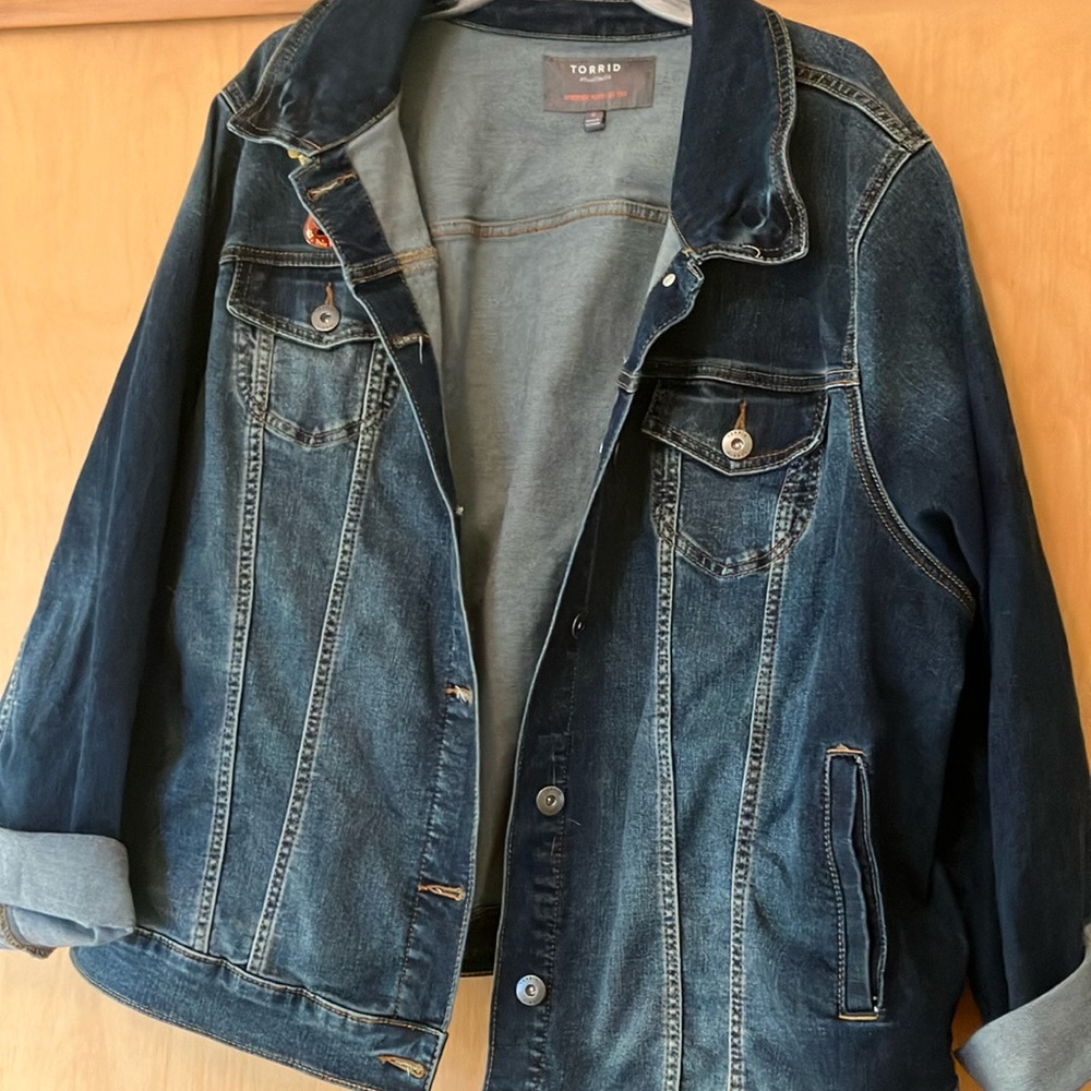 Slightly distressed Jean jacket.